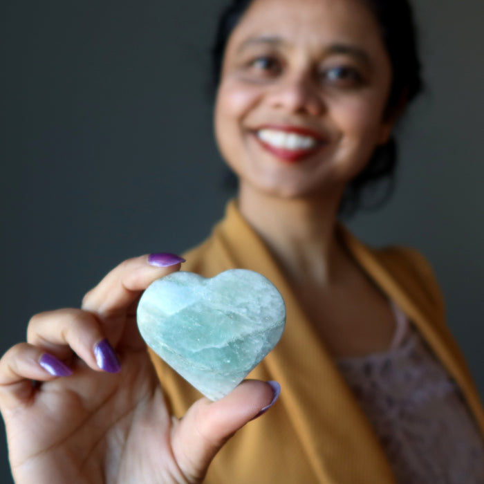 sheila of satin crystals holding aventurine heart