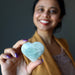 sheila of satin crystals holding aventurine heart