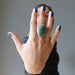 woman wearing large green aventurine oval ring