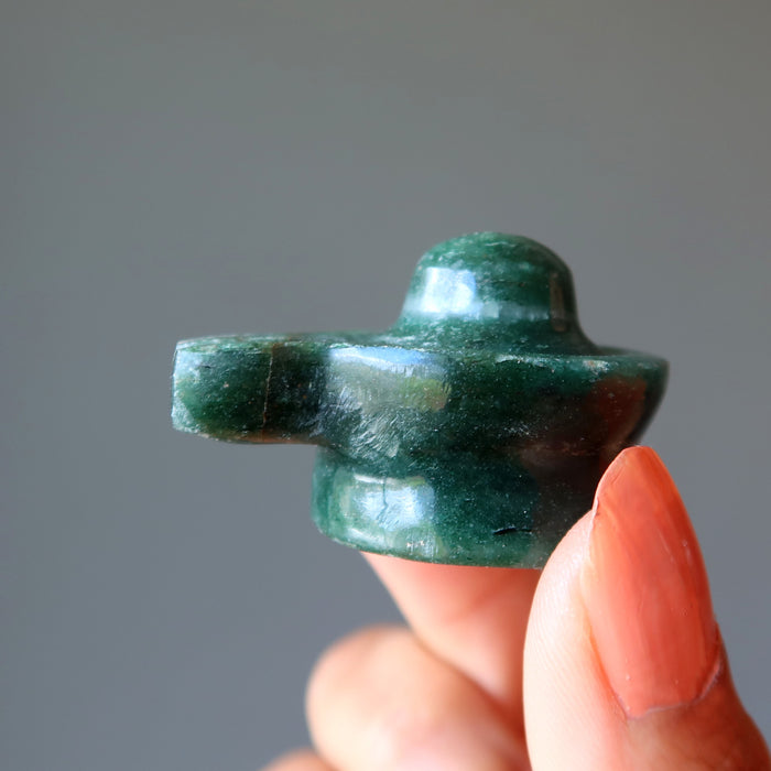 holding Green Aventurine Shivling 