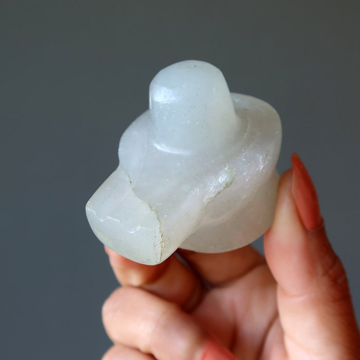 holding Green Aventurine Shivling