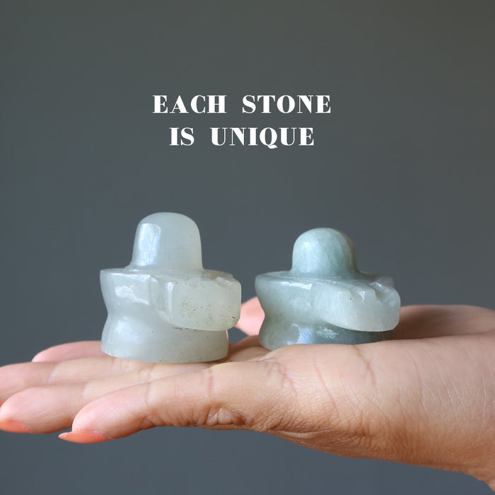 two Green Aventurine Shivlings on the model palm