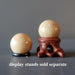 yellow aventurine spheres on stands