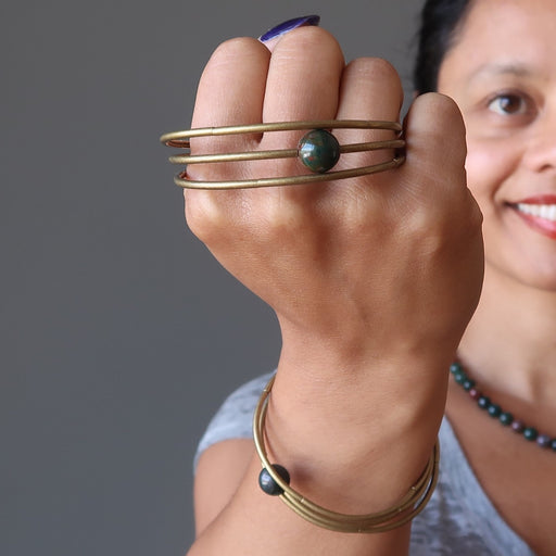 sheila of satin crystals presenting and wearing bloodstone coil bracelets