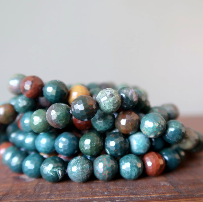 pile of faceted bloodstone bracelets
