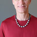 male model wearing howlite and bloodstone beaded necklace