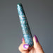 hand holding bloodstone massage wand