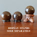three Bronzite Sphere on the wooden stands which sold separately