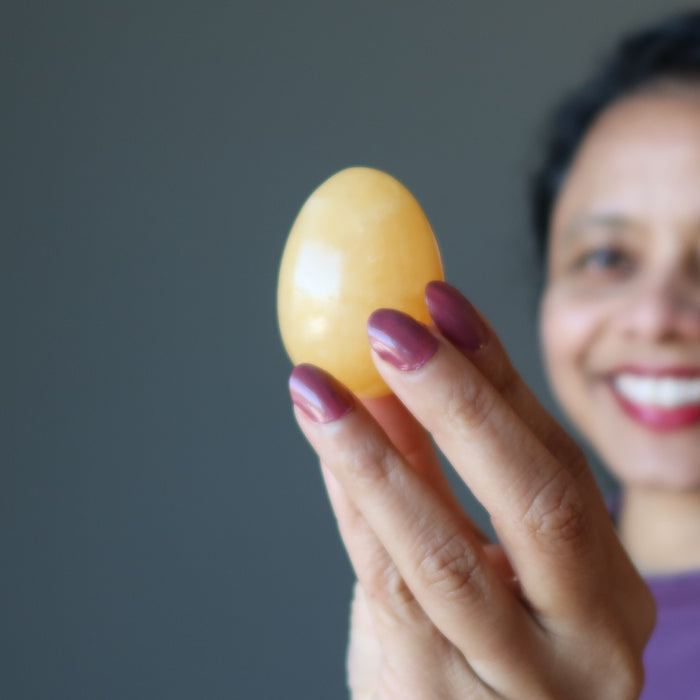 holding Golden Calcite Egg