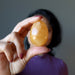 holding Golden Calcite Egg