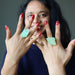 woman wearing green calcite rings