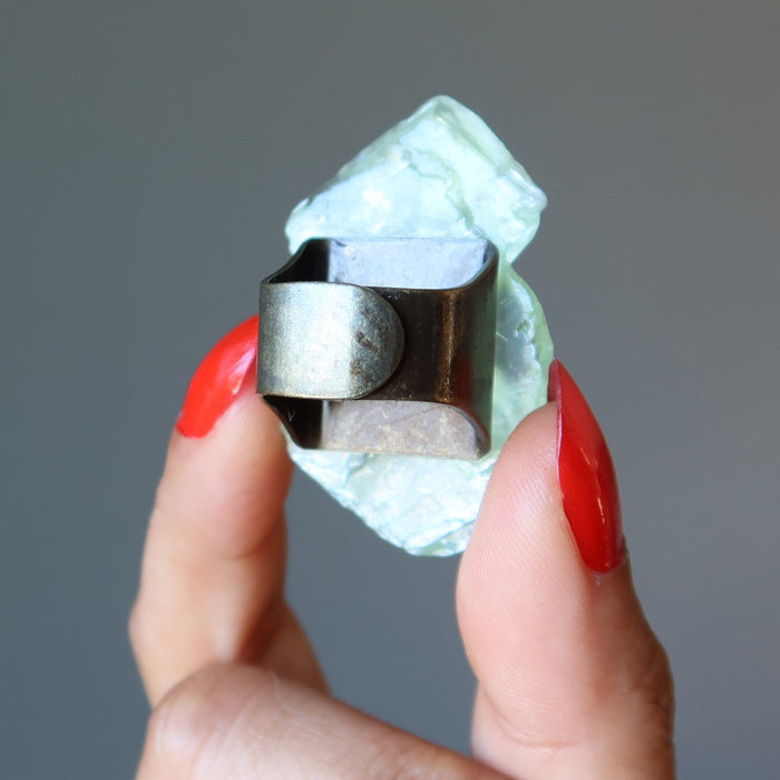 back of green calcite ring
