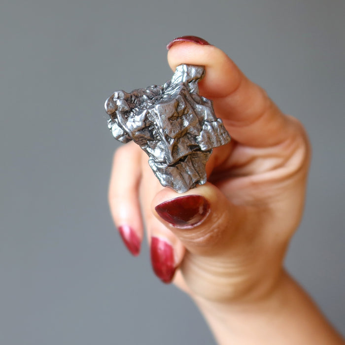 holding Campo Del Cielo Meteorite