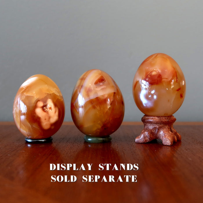 carnelian eggs on display stands