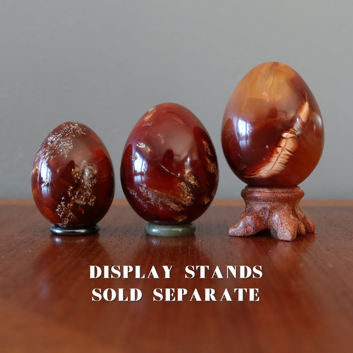 carnelian eggs on display stands