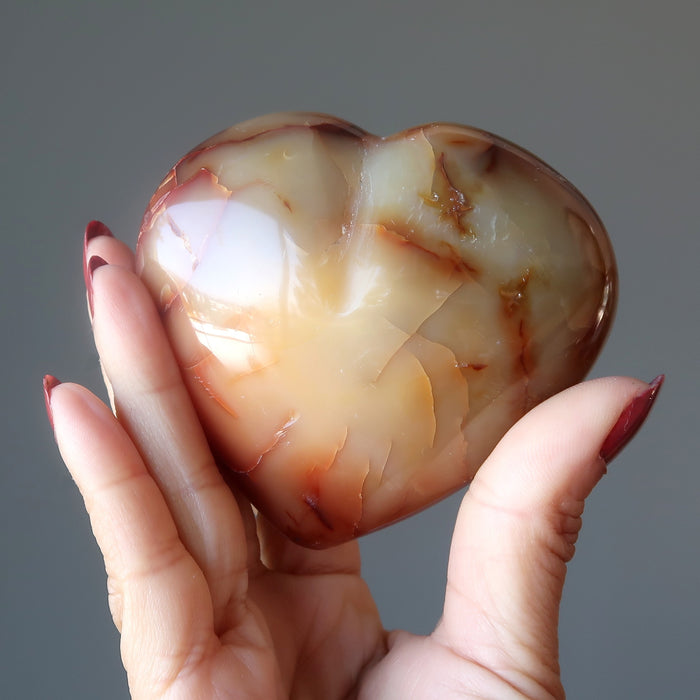 holding Orange Carnelian Heart