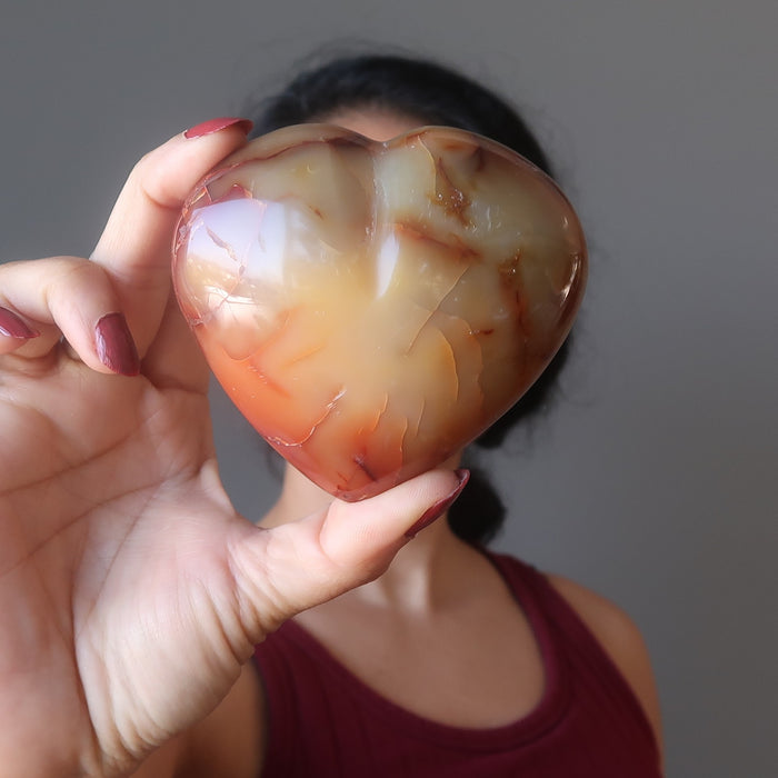 holding Orange Carnelian Heart