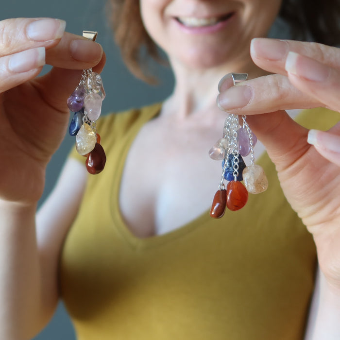 holding both hands Dangling Chakra Rainbow tumbled Stone Pendants