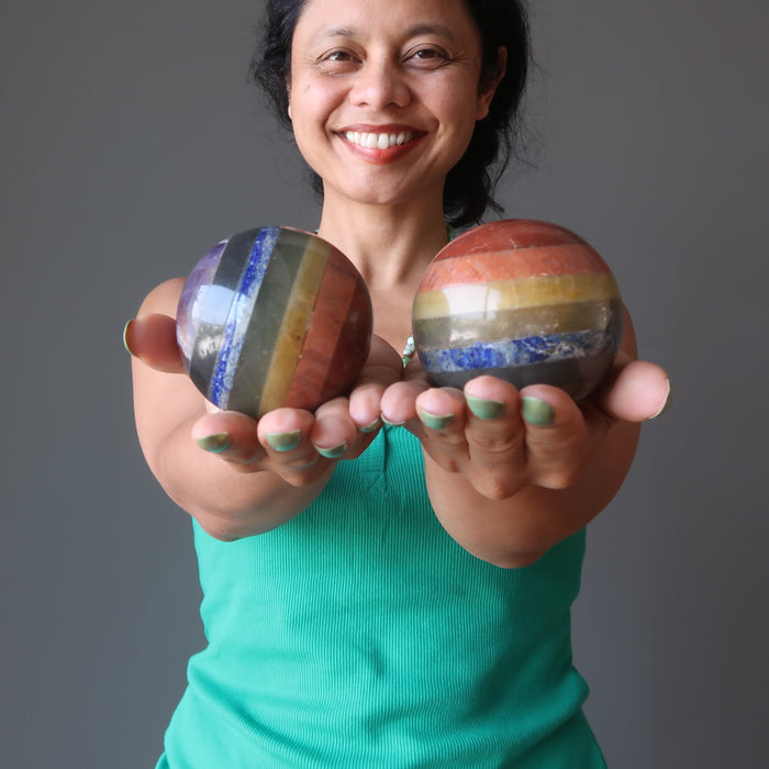 sheila of satin crystals holding 2 chakra spheres