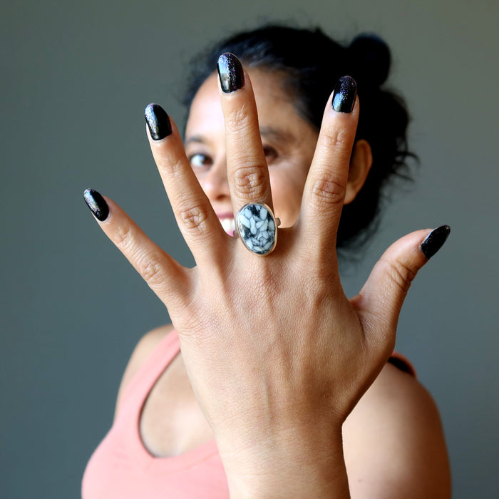 woman wearing chrysanthemum stone ring