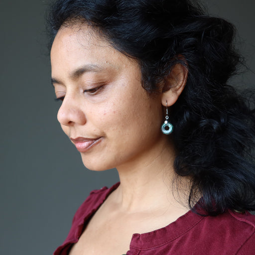 sheila of satn crystals wearing blue Chrysocolla donut Earrings 
