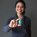 woman  with chrysocolla egg at heart chakra