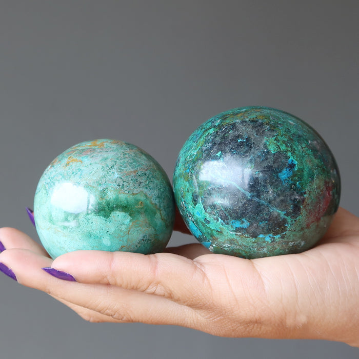 chrysocolla spheres in hand
