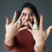 woman wearing two citrine geode rings