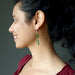 sheila of satin crysals wearing green Chrome Diopside dangling on stars sterling silver earrings