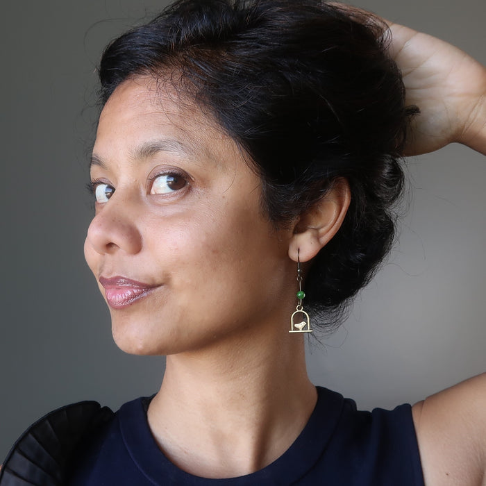 sheila of satin crystals wearing green diopside on birdcage dangle earrings