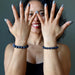 sheila of satin crystals wearing Dumortierite Bracelets on both wrists