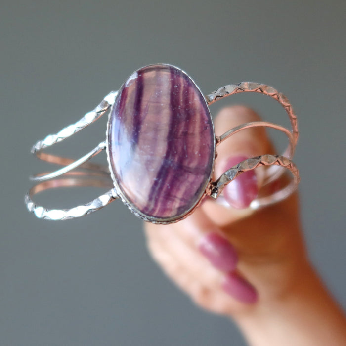 holding Purple Fluorite Cuff Bracelet 
