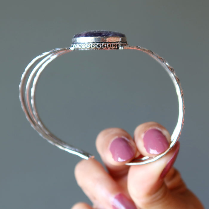 holding Purple Fluorite Cuff Bracelet 