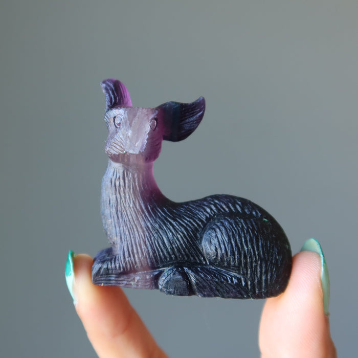 holding rainbow Fluorite Deer Figurine