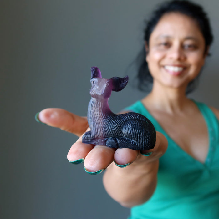 sheila of satin crystals holding rainbow Fluorite Deer Figurine