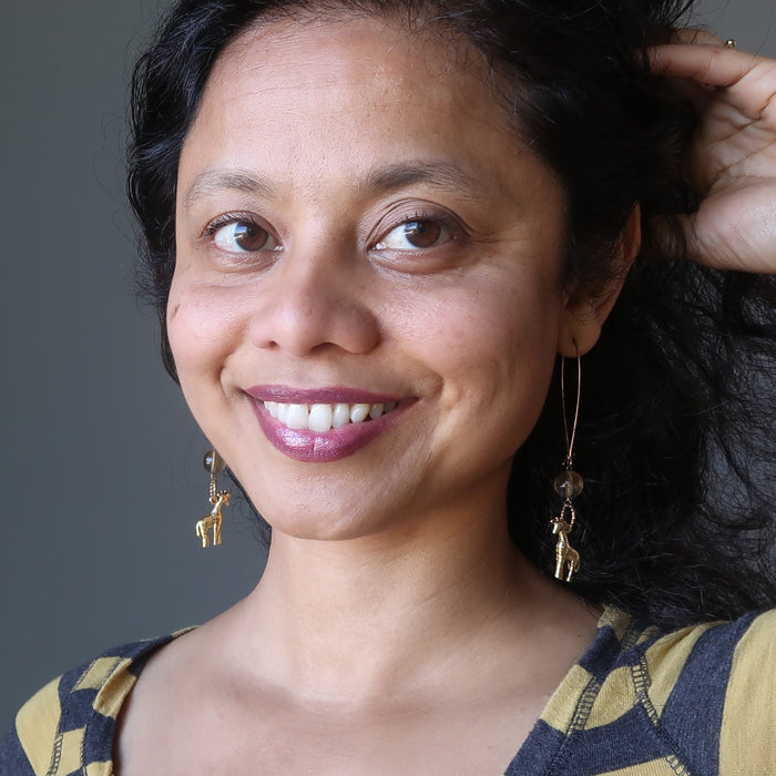 woman modeling fluorite giraffee earrings