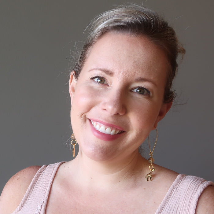 woman modeling fluorite giraffee earrings