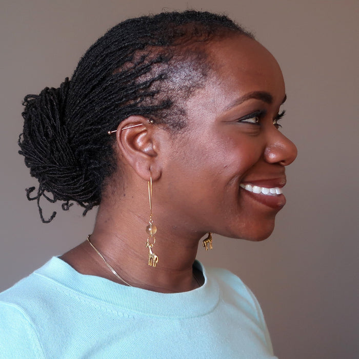 woman modeling fluorite giraffee earrings