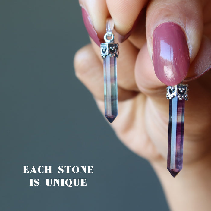 model holding twp Purple Rainbow Fluorite Pendants on Sterling Silver