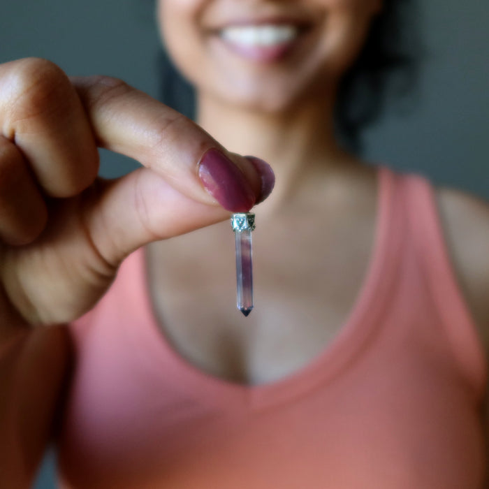 holding Purple Rainbow Fluorite Pendant 