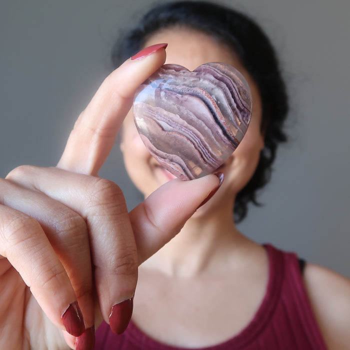 model holding a Fluorite Heart