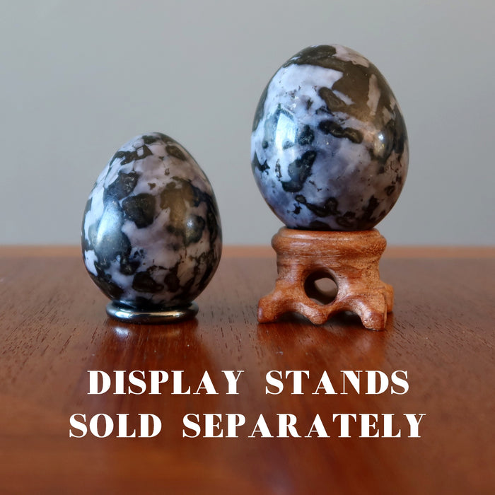 two Gabbro Eggs each displaying on stands