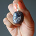 holding garnet nugget pendant
