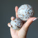 spessartine garnet spheres in hand