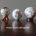 spessartine garnet spheres on stands