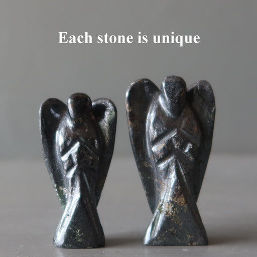 two praying hematite angel figurines