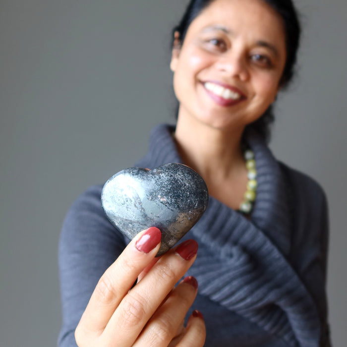 sheila of satin crystals holding hematite heart
