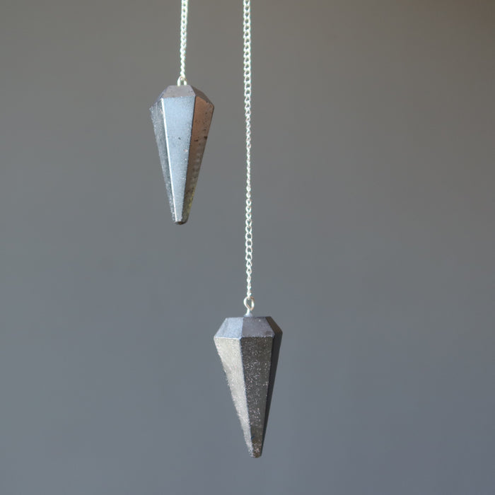 two hematite pendulums