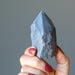 hand holding hematite tower