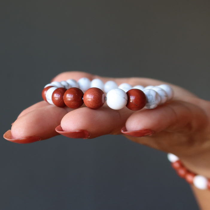 holding Howlite Red Jasper Bracelet on the palm